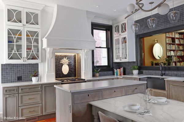 Victorian kitchen renovation with custom cabinetry, restored fireplace range hood, and heartwood pine floors