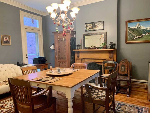 Dining room with original fireplace.